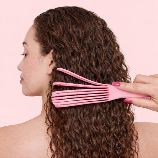 Cepillo desenredante flexible